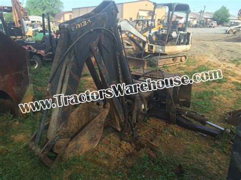 new holland backhoe attachment price